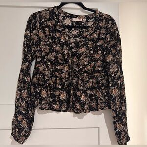 SO blouse in excellent condition. Black floral XS
